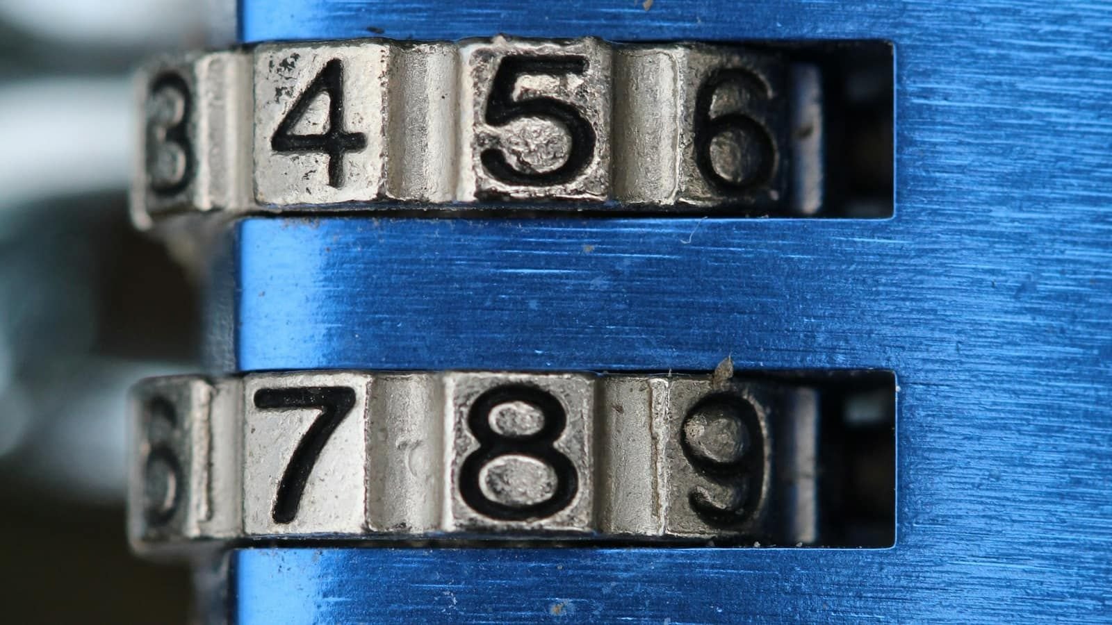 Close-up of the number dials on a blue combination lock